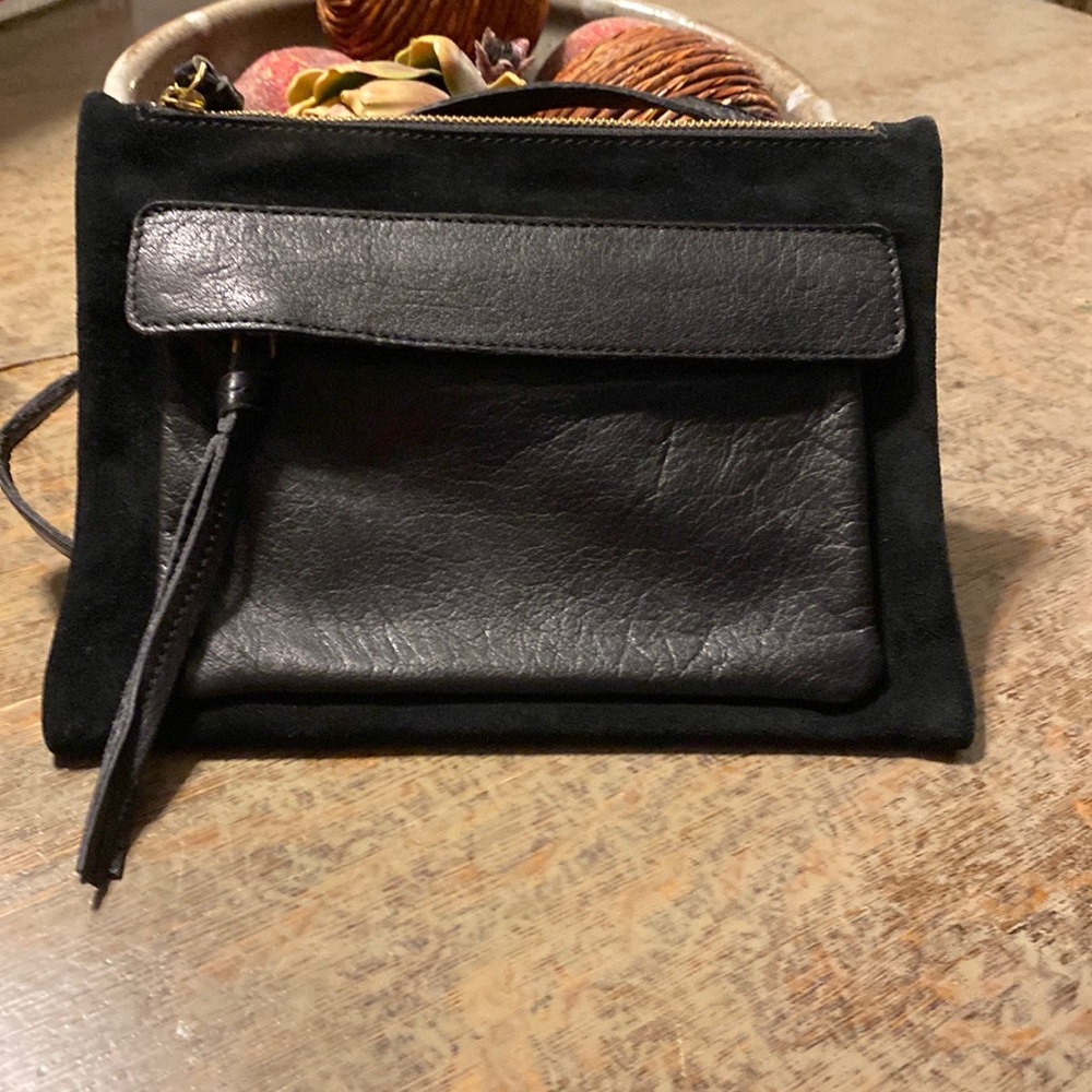 Black leather (cow/buffalo) crossbody.